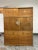 Design Plus Gallery presents a Three Piece Japanese Tansu with Mother of Pearl Inlaid in Kiri Wood. The upper section has...