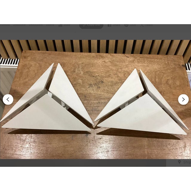 Lightgarden w2 sconces. the way bright sunlight appears as it bursts through the canopy of a grove of trees. The angular...