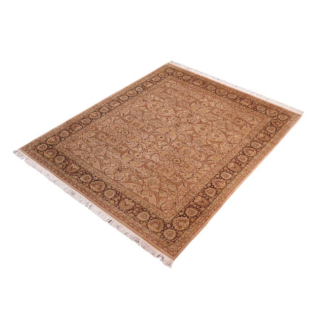 Designed with mesmerizing intricacy and gorgeous color palette, this hand-knotted masterpiece demonstrates the beauty and...
