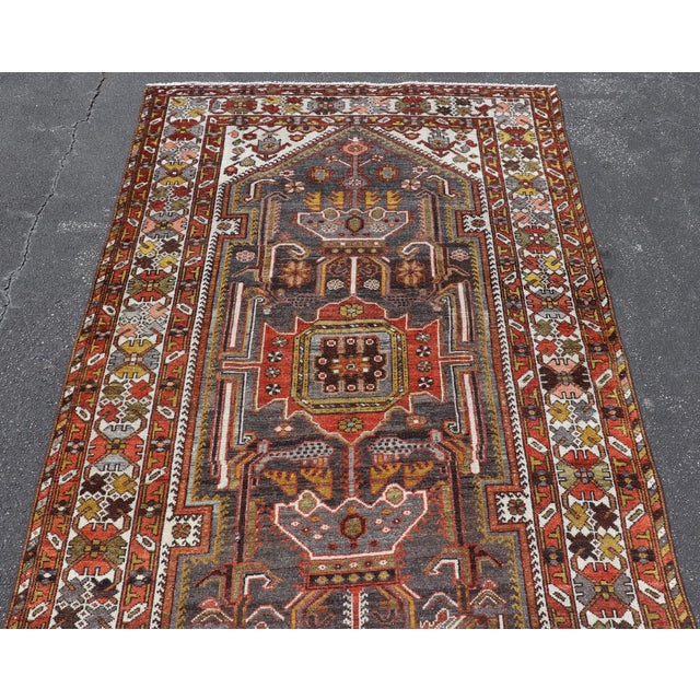 Textile Antique Persian Bakhtiar Gallery Rug Featuring a Multi-Medallion Tribal Design For Sale - Image 7 of 16