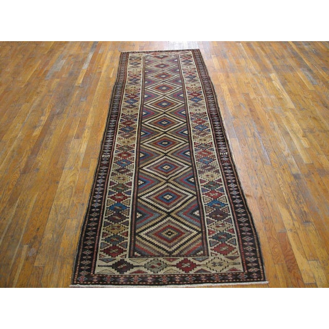 Handmade antique NW Persian carpet. Woven, circa 1900 (early 20th century). Persian informal rug, runner size: 3'2" x...