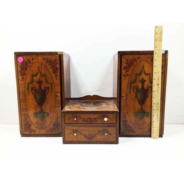 An exceptional and highly charming Edwardian-era Neoclassical Revival miniature vanity chest, dating to circa 1890–1920....