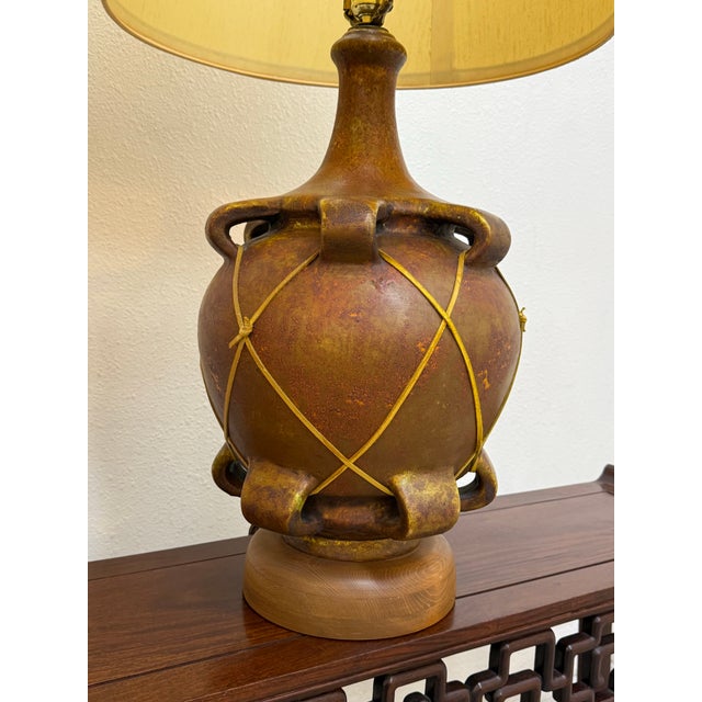 Beautiful pair of ceramic mid century modern table lamps in good vintage condition.