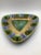 A gorgeous, rare vintage Sascha Brastoff hand painted triangle ashtray in an abstract mod pattern. It has a muted gold...