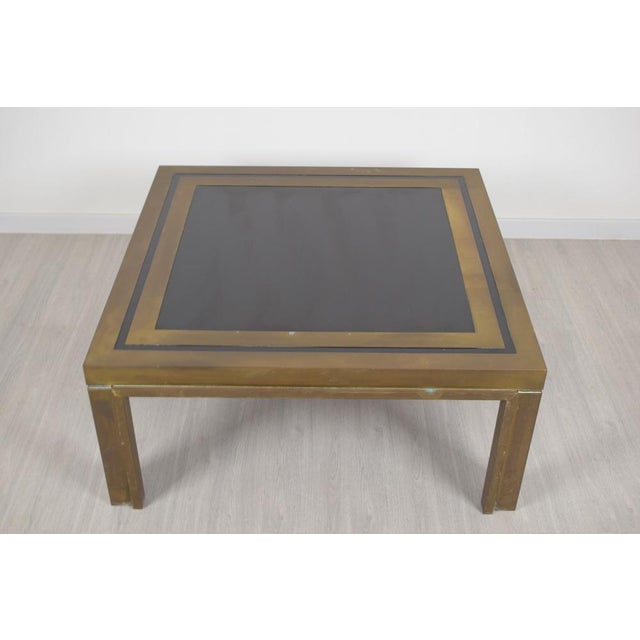Liwans coffee table, Italian production from the early 1970s, made in Rome. This piece is a refined example of modern...