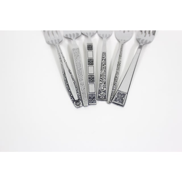 You will get the exact forks pictured. Curated vintage mismatched set of six mid century modern stainless steel salad or...