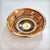 A ceramic bowl with a cutout design, decorated with spherical discs, by Georges Pelletier, 1970s. A unique piece made of...