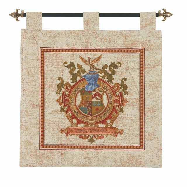 "This exquisite armorial tapestry showcases a regal coat of arms, intricately woven with rich colors and fine detail,...