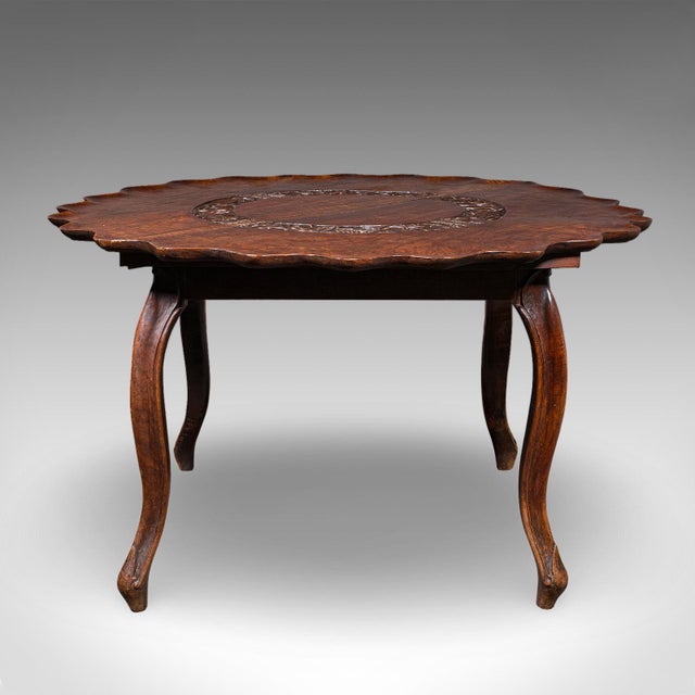 This is a large antique campaign silver presentation table. An Anglo-Indian, 4 seater colonial dining or tea table, dating...