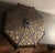 Handmade ceiling mount light from Steven Handelman Studios in Santa Barbara, CA has a black rust finish with an intricate...