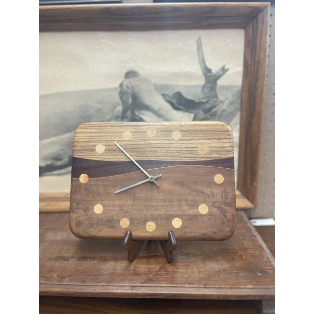 Mid Century Modern Wooden Clock with Four Deferent Types Of Wood Grain. Operational Ability Unknown. Vintage Condition...
