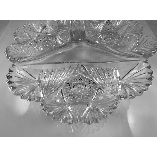 This is a very rare American Brilliant Cut Glass Serving platter with a handle. The platter has three wells that can hold...