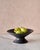 The Medium Handcrafted Ceramic Pedestal Bowl by NPage Studio X Lostine is a sculptural decorative vessel that blends...