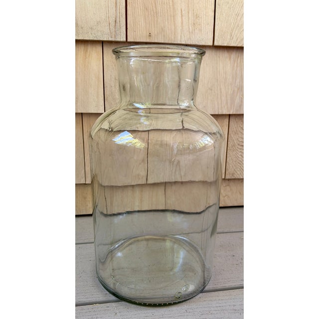 Large vintage wide mouth apothecary jar, clear with just a hint of green. Perfect for the display of shells, sea glass and...