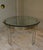 This elegant round dining table is a piece of 1970s Italian design. High-quality materials are featured in the frame,...