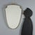 Wall mirror dating back to the 1950s-60s, featuring a brass frame with elegant spiral decorations that add a touch of...