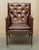 This is a exquisite original fully restored hand dyed brown leather Chesterfield library armchair from the George III era...