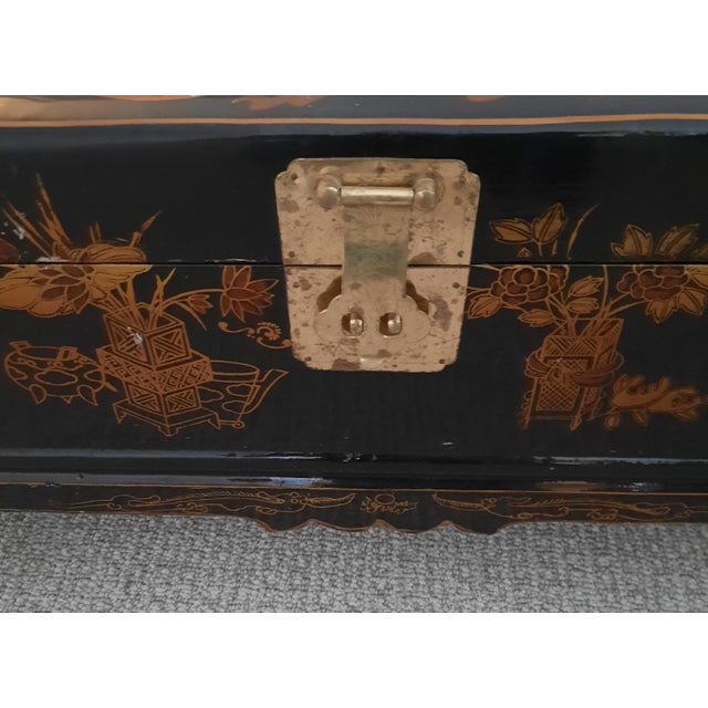 Beautiful Chinese Black Laquer Hand Painted Chest with Paper Lining with Chinese Characters and Brass Hardware also has...