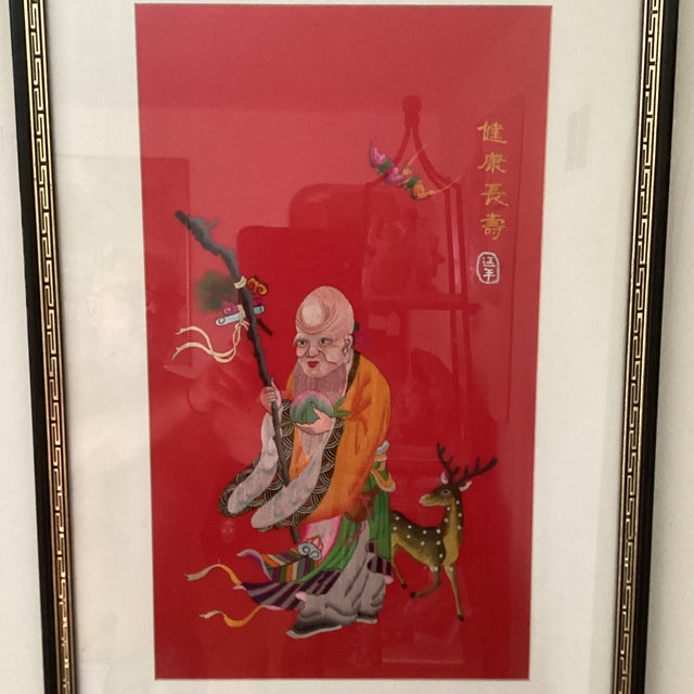 A large Chinese embroidery work of art presented in a carved gilt frame. Circa late 19th century. The impressive work...