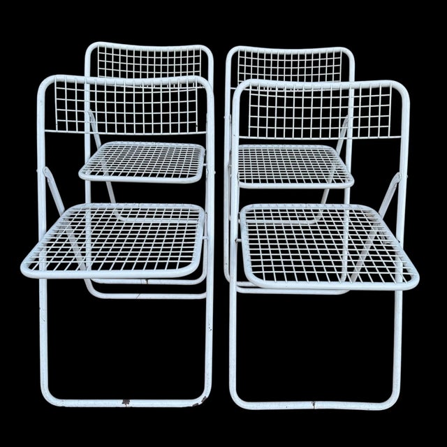 4 Classic folding chair Ted Net design from the 1970s. Designed by Niels Gammelgaard for Ikea. The wire chair is painted...