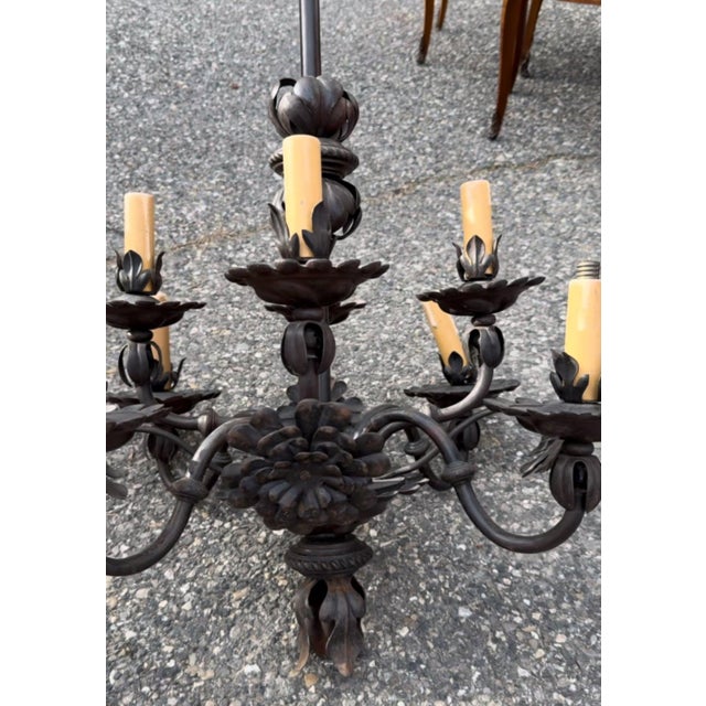 French floral 8-light light iron chandelier with hand dodged leaf details. Newly rewired. 22”dia x 30”h 47-083