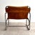 Armchair by Antonello Mosca, chromed steel frame and leather seat, for Produzione Forma, 1970s. The armchair features a...