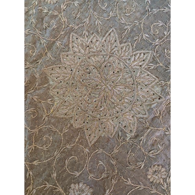 Textile Art. Round beaded table topper. Visual interest off the chart. Maybe called a centerpiece runner. Covered in...
