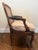 Beautiful carved antique chair with caned seat and back. Caning is in very good condition with the original wood pegs...