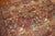 21st century Turkish contemporary wool rug with a an all-over floral design in field and border with autumn colors....