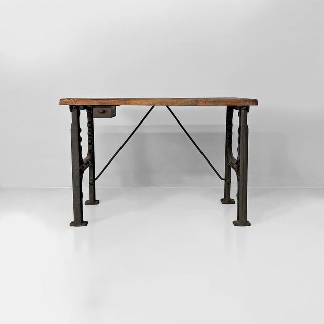 Italian industrial wooden and cast iron console, 1800s Industrial-style console table with a rectangular solid wood top...