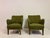 A pair of Model 1748 lounge chairs designed by Peter Hvidt and Orla Mølgaard-Nielsen, Denmark, circa 1950s. These elegant...