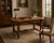 A finely carved Renaissance Revival writing desk, crafted in solid oak with exceptional detailing and an inset tooled...