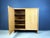 Timeless clear oak 2 door cabinet offering plenty of storage space. Very well crafted piece with integrated carved out...