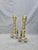 This is a pair of solid brass vintage andirons. They have elaborate column bodies and scroll feet. These would be the...