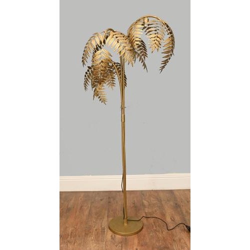 Decorative vintage hollywood regency floor lamp designed in the form of a stylised palm tree the lamp features a tall...