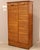 Double-shutter filing cabinet Made of oak Early 1900s Dimensions: width 99 cm, depth 43 cm, height 180 cm Restored (see...