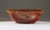 A large carved agate bowl with a beautiful shape rising on a conforming foot. Measures 9 1/8" x 7" x 3" high. Good...