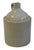 Beautifully balanced antique stoneware jug with a primitive design, featuring a rich, cream-colored cylindrical body....