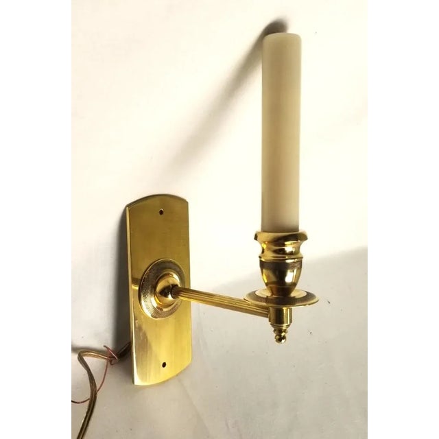 This charming sconce will elegantly light up your space with ease! Featuring rich brass and faux candle, we know you'll...