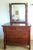 Gorgeous American Empire chest of drawers with mirror resting on turned column supports. The mirror can be moved forward...