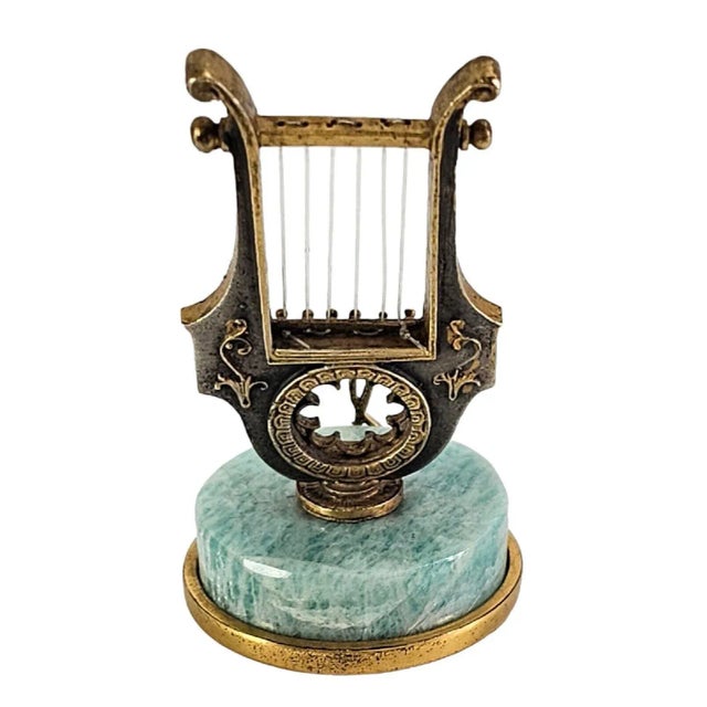 This Italian figural place card holder is attributed to the iconic Roman jeweler, Angeletti. Handcrafted with great...