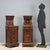 Pair of Neo-Renaissance walnut bedside tables. Paneled door with a carved rosette in the center, column-shaped side...