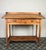 Excellent pitch pine clerk desk with raised back and sloped writing surface over a single fall-front cupboard with key,...