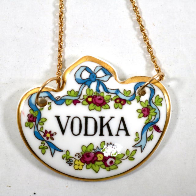 Fine bone china decanter tags by Crown Staffordshire, England. Includes tags labeled Vodka, Whisky, Scotch, and Gin, each...