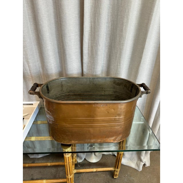 Antique handled copper Rochester boiler/washer. Also cab be used as a log holder.