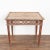 The paint is all original on this pine side table with tapered legs from Sweden. The decorative carved/lattice skirt...