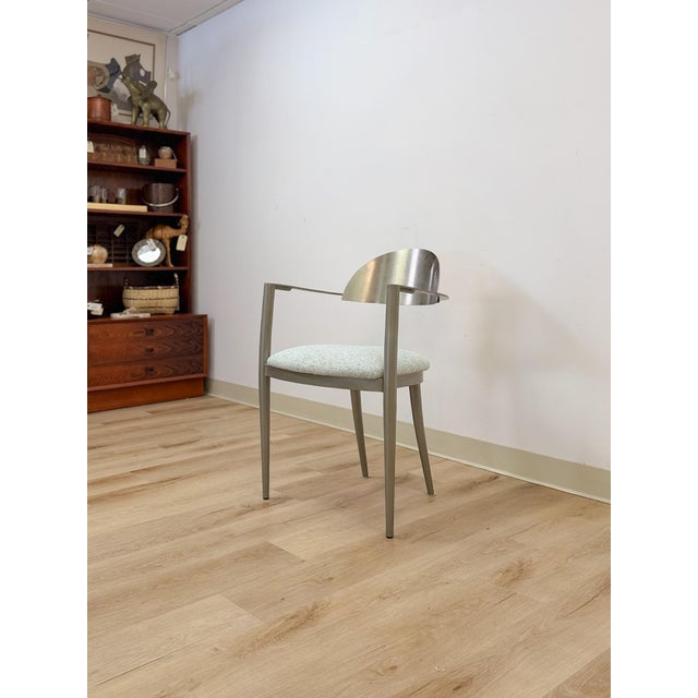 This striking vintage Elite Modernist stainless steel back dining and accent chair is a bold and sophisticated seating...