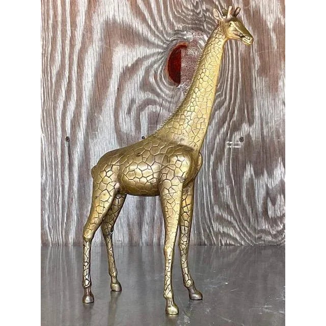 A terrific vintage Boho giraffe statue. A chic solid brass with beautiful attention to detail. Acquired from a Palm Beach...