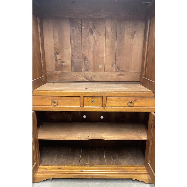 An Amazing French linen Press Armoire, Walnut with Wonderful Book Match Burl Veneer Details. Dovetail Construction, With...