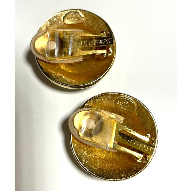 A glamorous pair of oversized statement earrings by Les Bernard, dating to the 1980s. These striking circular earrings...